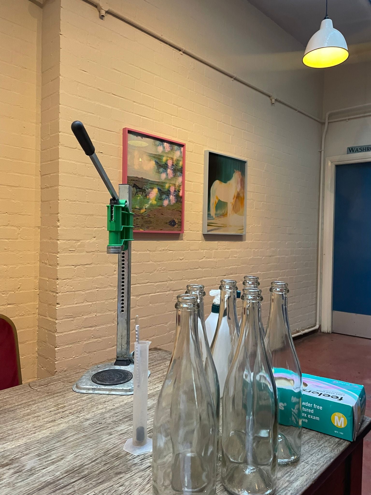 Empty bottles and capping machine set up ready for the Pet Nat workshop