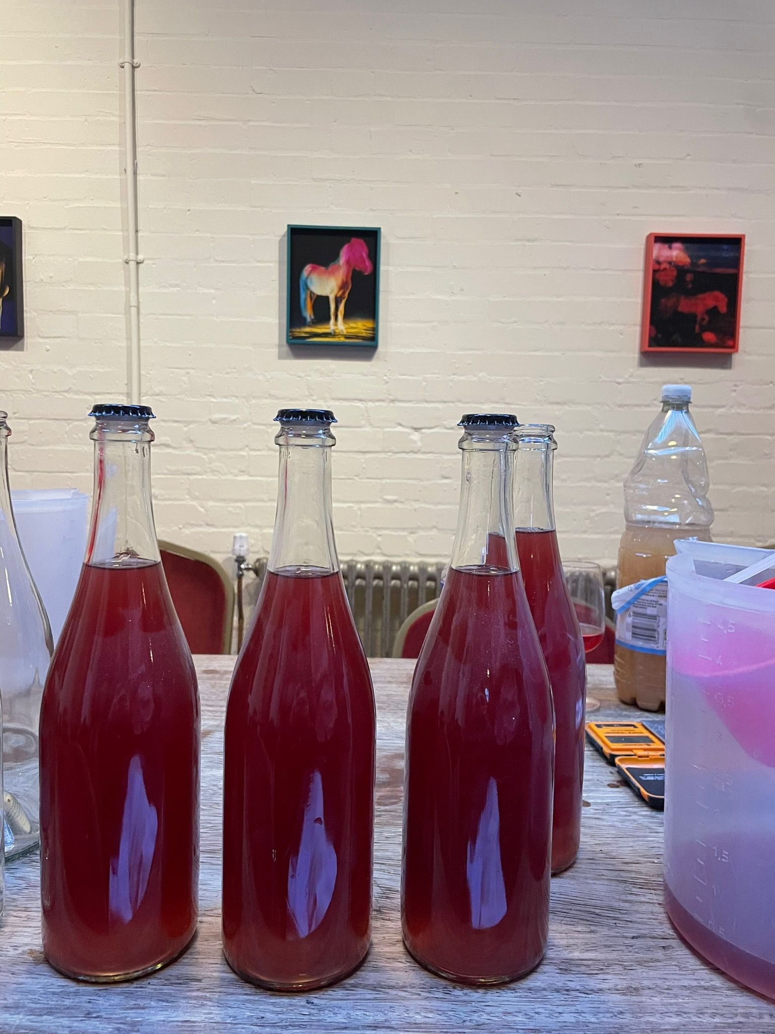 Finished bottles of red Pet Nat sparkling wine from the Numbers Winery workshop