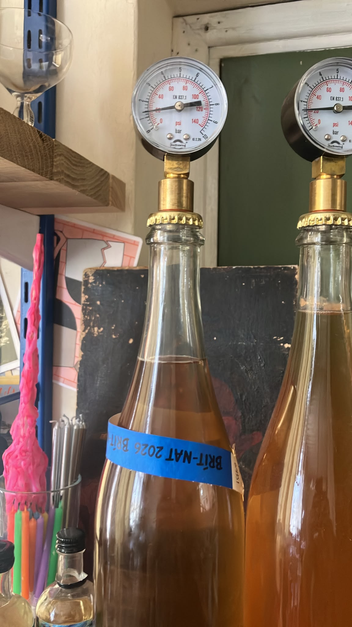 Pressure gauges on Pet Nat bottles being monitored at Numbers Winery